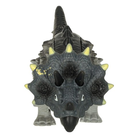 Dinozaur Triceratops chodzi świeci ryczy