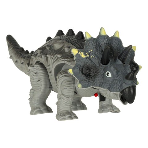 Dinozaur Triceratops chodzi świeci ryczy