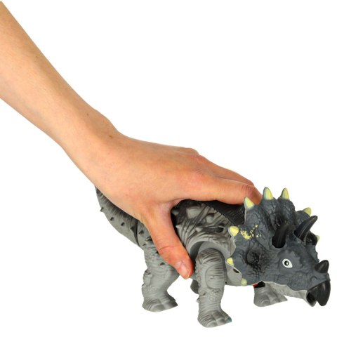 Dinozaur Triceratops chodzi świeci ryczy